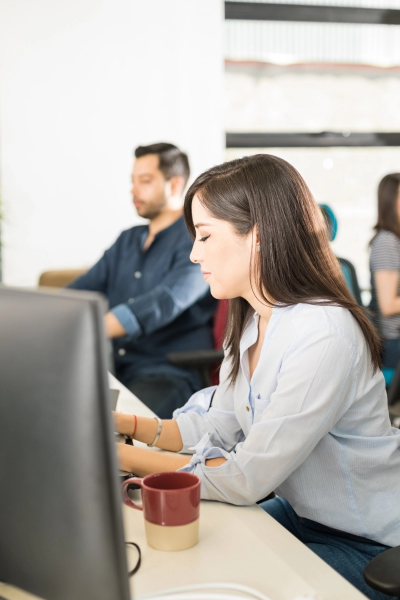 Close up of person working on a computer
