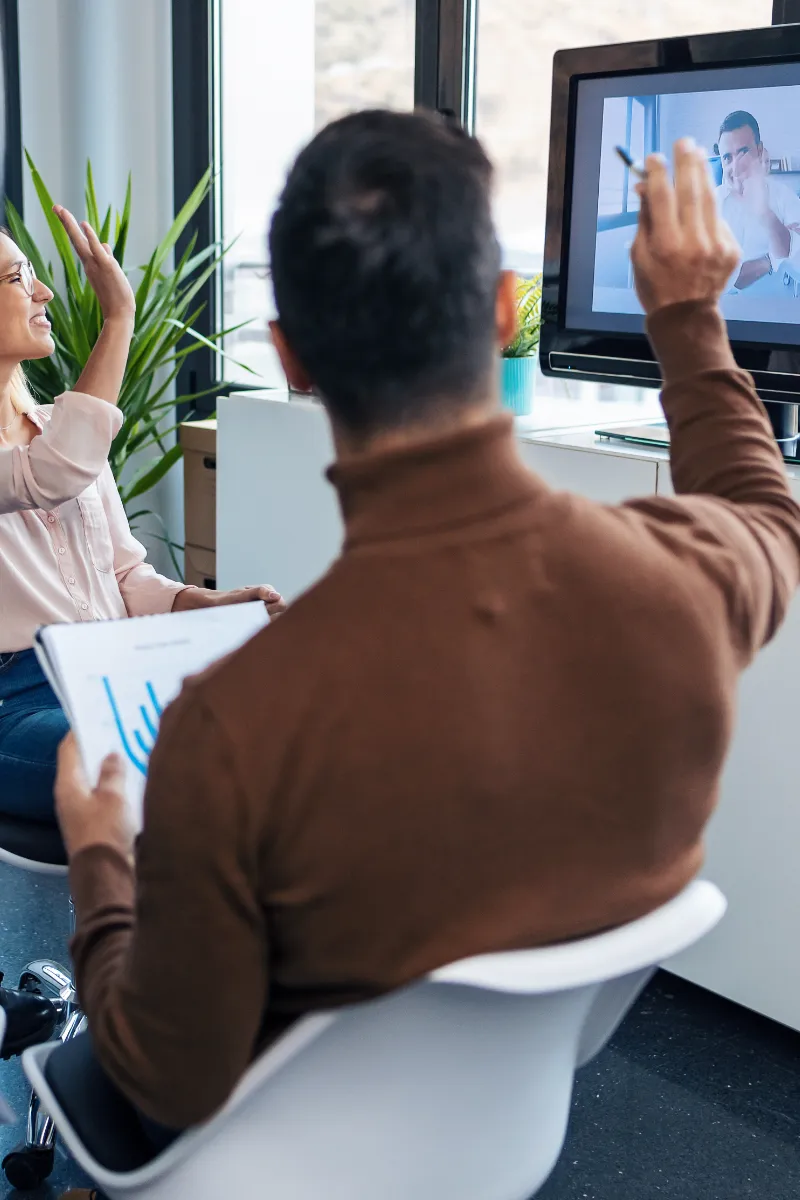 Employees doing IT training video