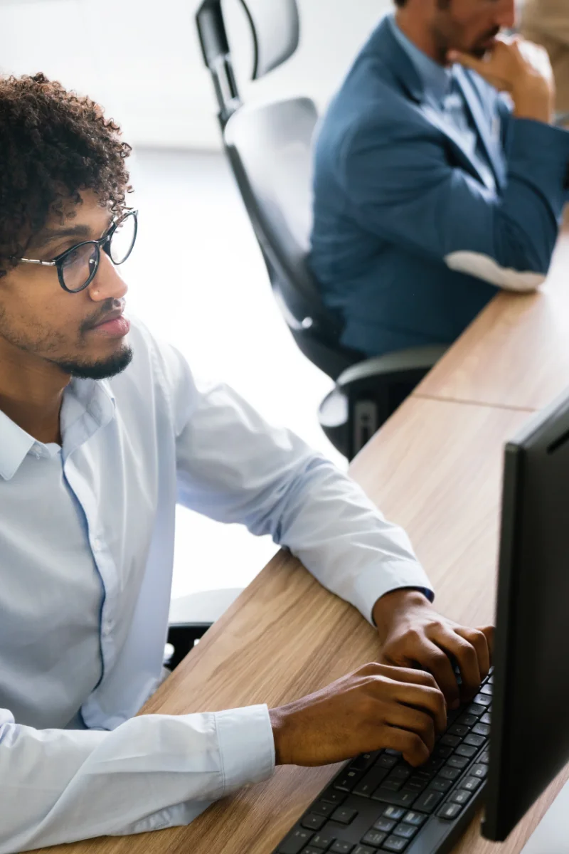 business people group of programmer working as team to find solution to problem